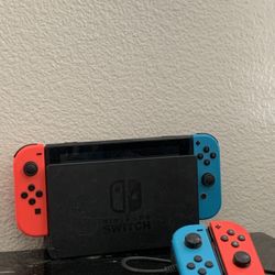 Nintendo Switch With Four Controllers