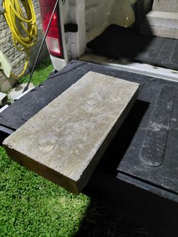 Solid concrete stone 16x8 $1 each i have 11 pcs