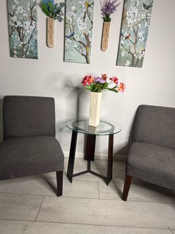 Two accent chairs and side table