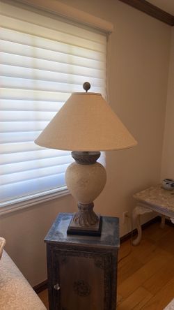 Lamp and wooden cabinet stand