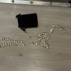 Brand new 14 karat gold plated rosary    $15 Hanford 
