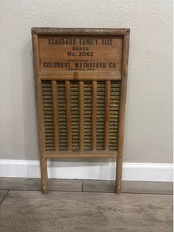 Antique metal and wood washboard