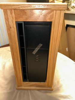 Heat surge Wood and Black Tower Amish portable heater.