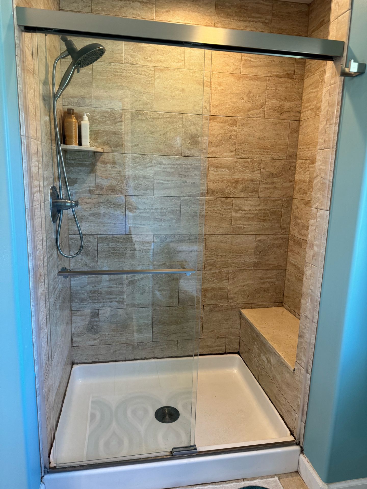 Frameless Glass Sliding Shower Door With Towel Bar. Available June 2024