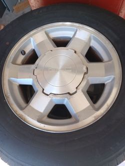 4 245/70r17  GMC rims and tires