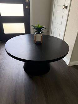 Round Black Pedestal Coffee Table