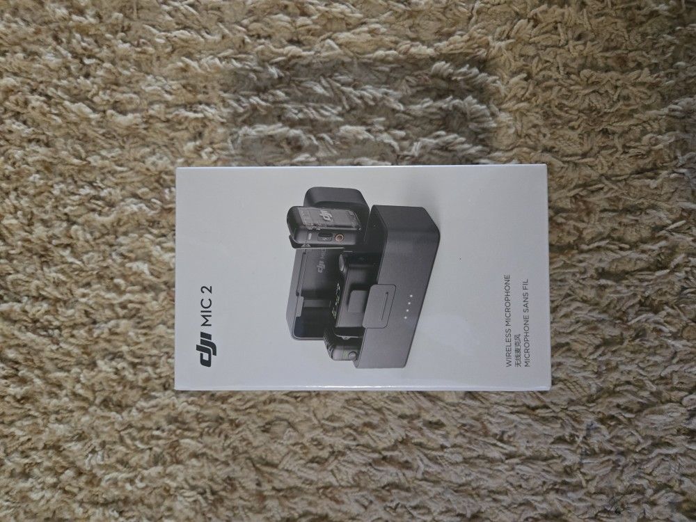 Brand new DJI Mic 2 ( 2 TX and 1 RX and charging case)