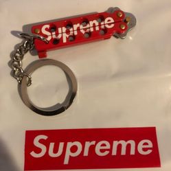 Supreme butterfly knife keychain red deals