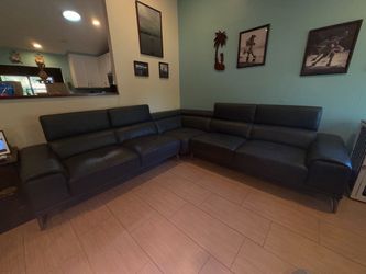 Blue leather L-shaped couch