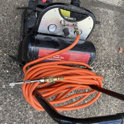 "STRIKE FORCE" 3.5 HP 4.6 Gallon Twin Tank Air Compressor.