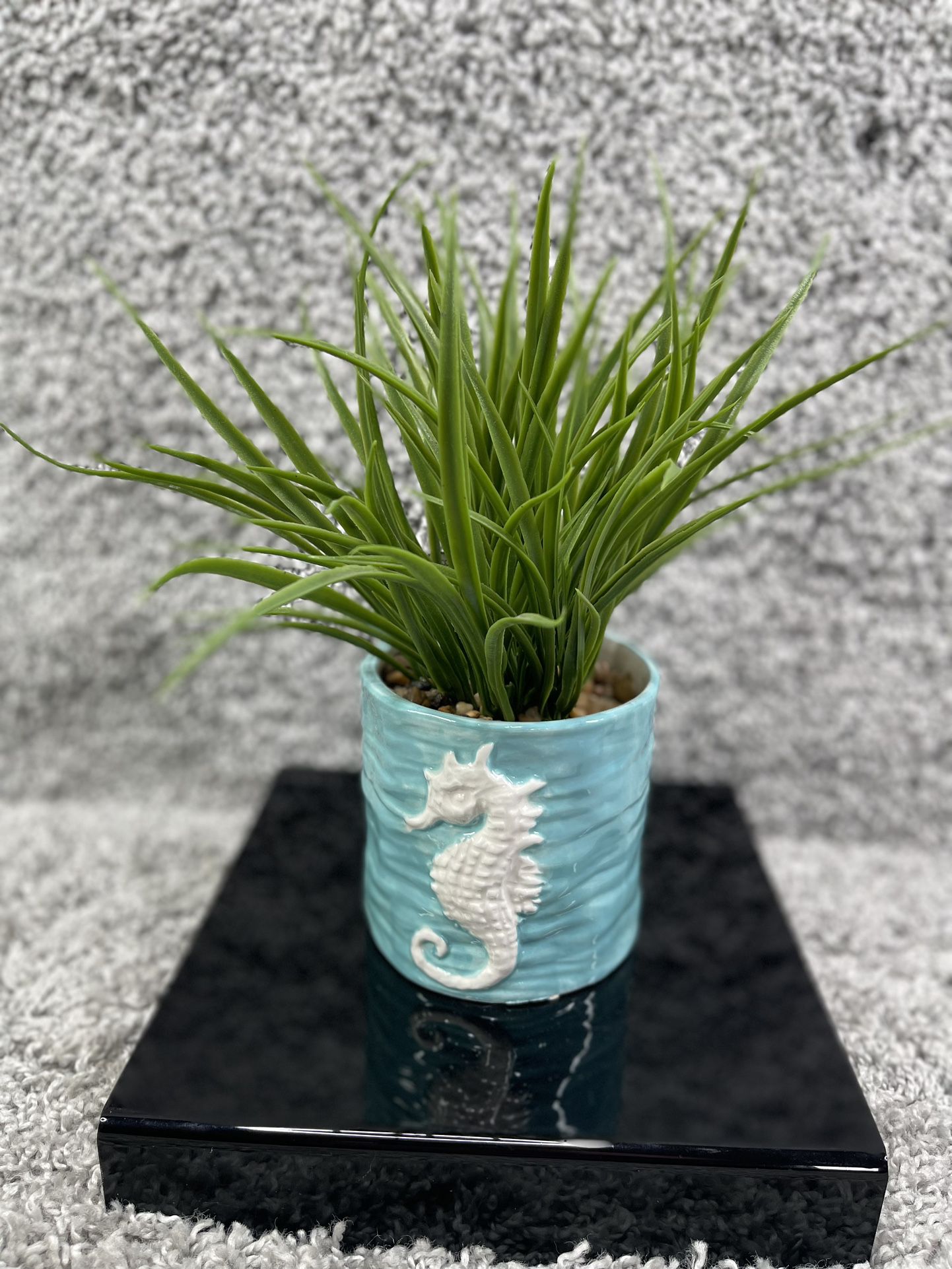 Green Artificial Grass Plant With Carved Sea Horse In Pot