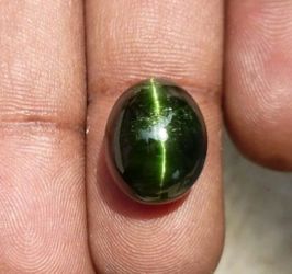 18.25 cts kornerupine cat eyes. Very rare genuine. Return acceptable