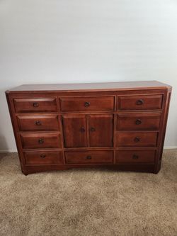 Raymour and Flanagan Dresser with 12 drawers and 2 doors