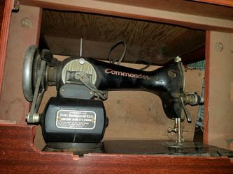 Old Sears sewing machine with table.