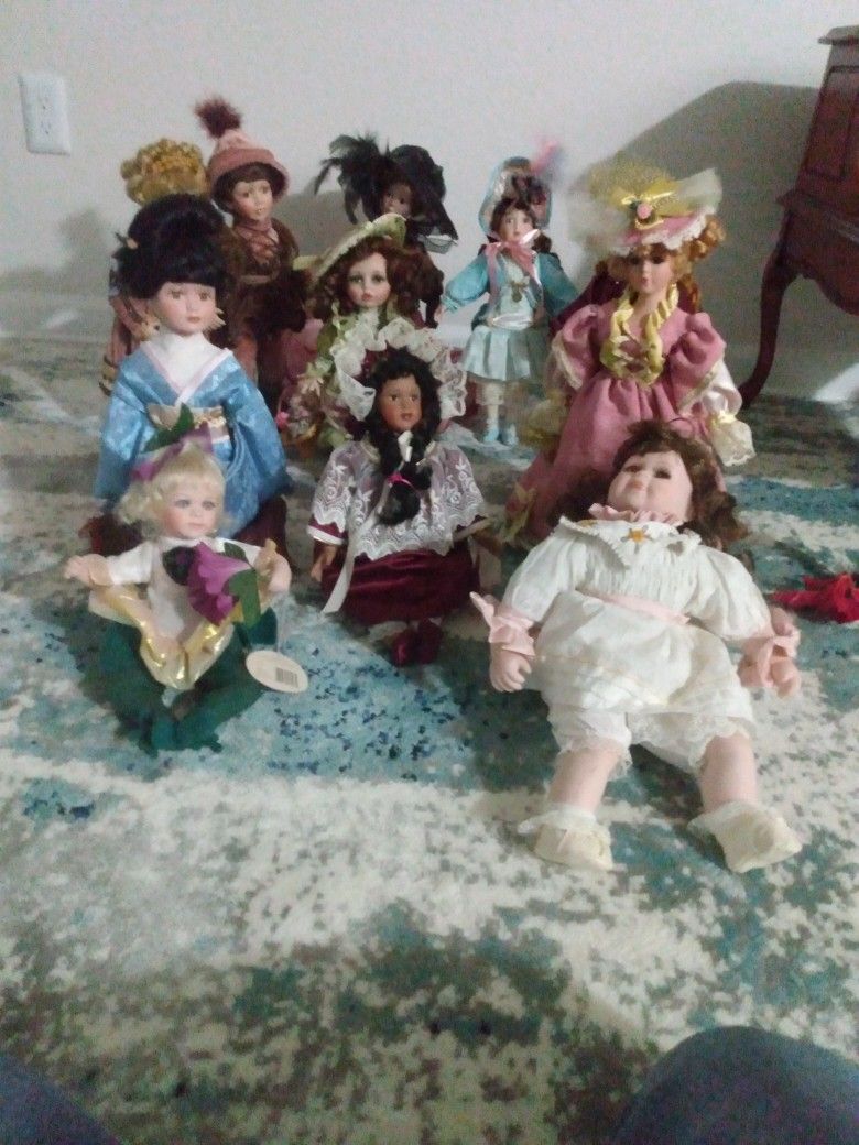 11 Old Porcelain Dolls