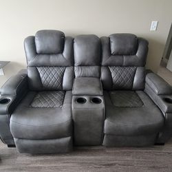 GREY LEATHER POWERED DUAL RECLINING LOVESEAT