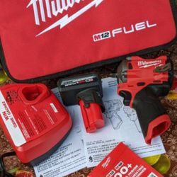MILWAUKEE M12 FUEL  12-VOLT STUBBY  3/8 IN  IMPACT WRENCH WITH HIGH OUTPUT 5.0AH BATTERY  CHARGER AND SOFT CASE 