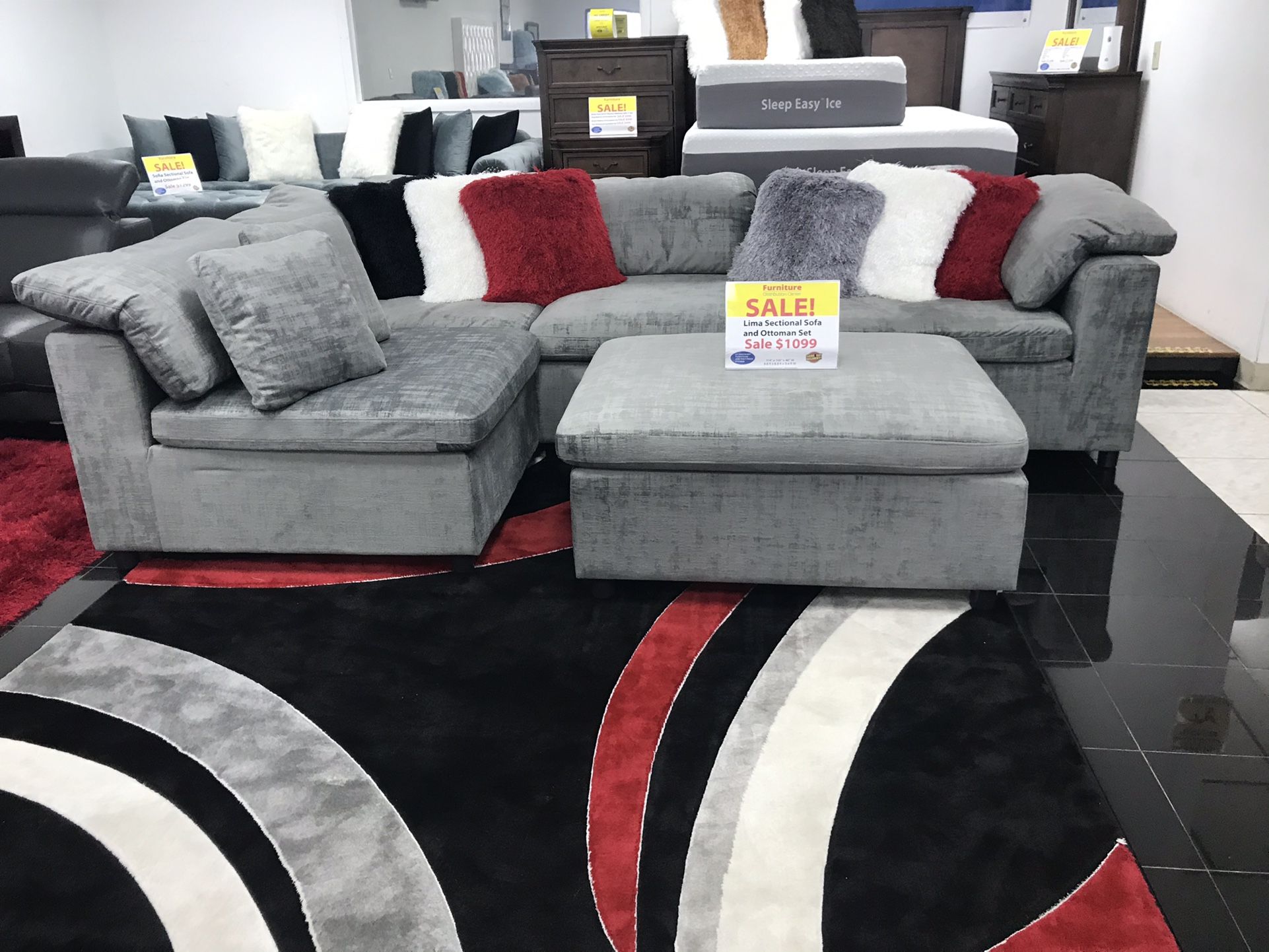 BEAUTIFUL GRAY MODULAR AND OTTOMAN. SAME DAY DELIVERY AND EASY FINANCING .