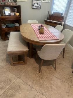 Almost new beautiful dining room table- solid