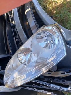 Volkswagen Jetta headlight OEM 2005-2010 left side