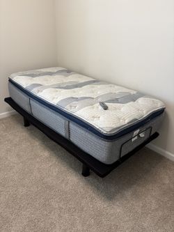 Reverie Adjustable Electric Twin XL Bed Frame w/remote & Twin XL Serta icomfort hybrid mattress. Great condition. Retailed over $1,000. Adjustable top