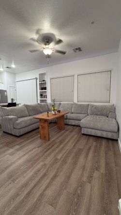 Ashley’s furniture grey sectional sofa couch with chaise