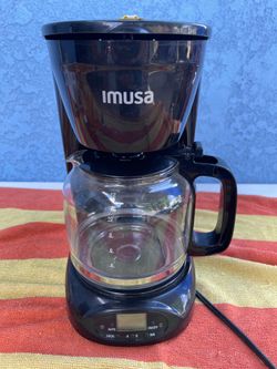 black IMUSA 12-cup programmable drip coffee maker featuring a glass carafe and a digital control panel