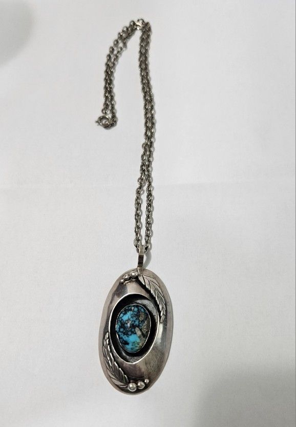 Navajo, sterling silver shadowbox pendant with kingman turquoise stone