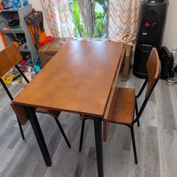 Table With Two Folding Sides And 2 Chairs