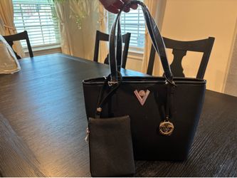 Valentino Orlandi, Black purse new with tags and plastic still on