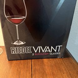 2 burgundy riedel wine glasses