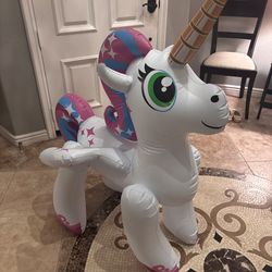 Unicorn blowup with water fountain