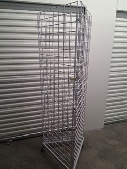 Rolling Grid Display with Waterfall J Arms and Assortment of Hooks
