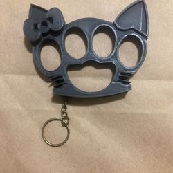 HELLO KITTY SELF DEFENSE KEYCHAIN  3D PRINTED black PLA+  MADE IN THE USA. 4.25” 