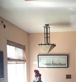 Hanging light fixture. Frank Lloyd Wright. Esk