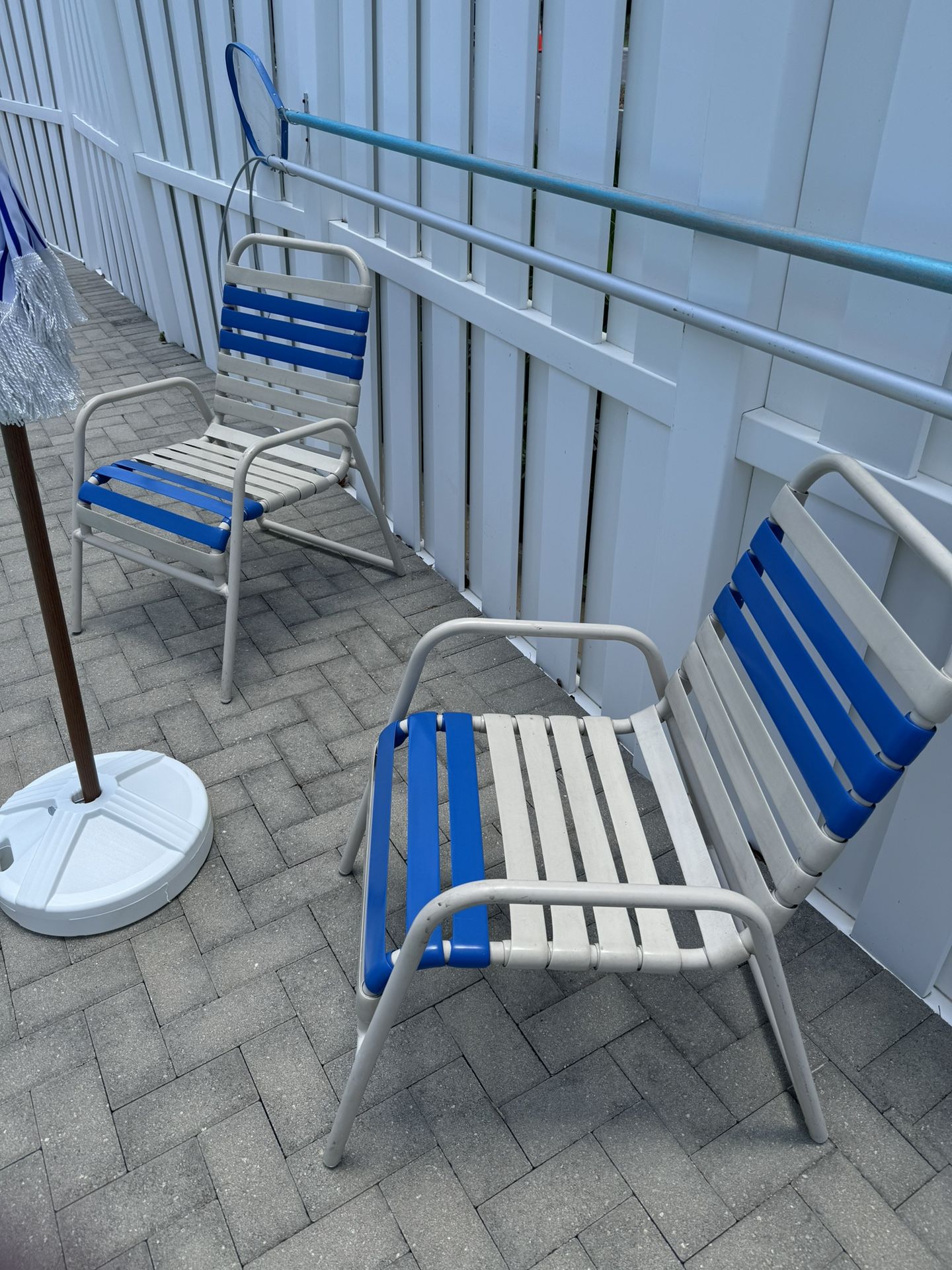 Four Patio Chairs.