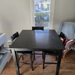 Table And 4 Chairs 