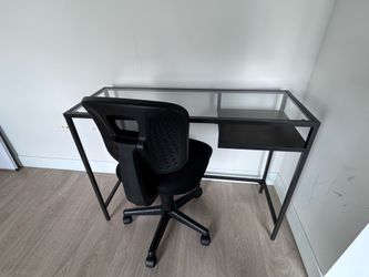 Small desk (IKEA) and swivel office chair