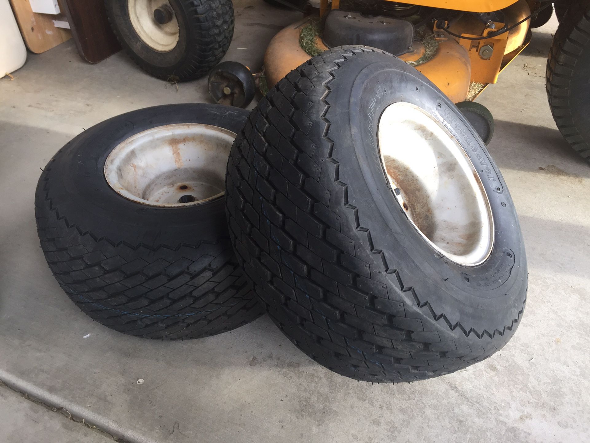 Lawn mower tracker tires.