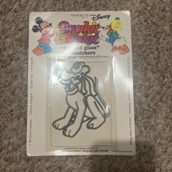 VINTAGE 1981 DISNEY MAKIT & BAKIT "STAINED GLASS" SUNCATCHER - PLUTO. Cardboard is peeling on back & is discolored 