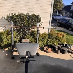 Workout Bench, Olympic Barbell, And Weight Plate Set