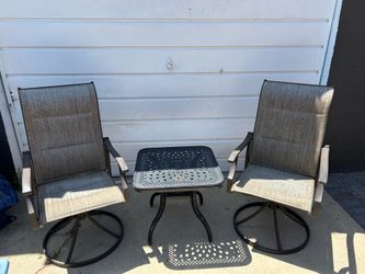 Modern three-piece metal bistro set with swivel chairs and square table gray