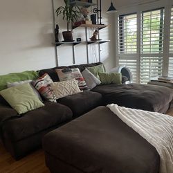 Brown couch and ottoman 