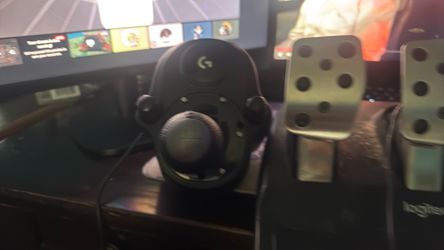Logitech racing wheel with shifter.