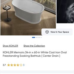 50 % off brand new stand alone tub Kohler new in box
