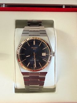 Tissot PRX powermatic 80 with 18k gold bezel