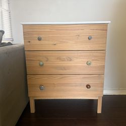 Wood dresser with Anthropologie knobs 