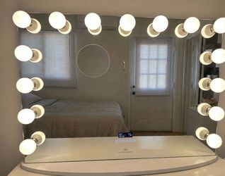 Vanity impressions mirror