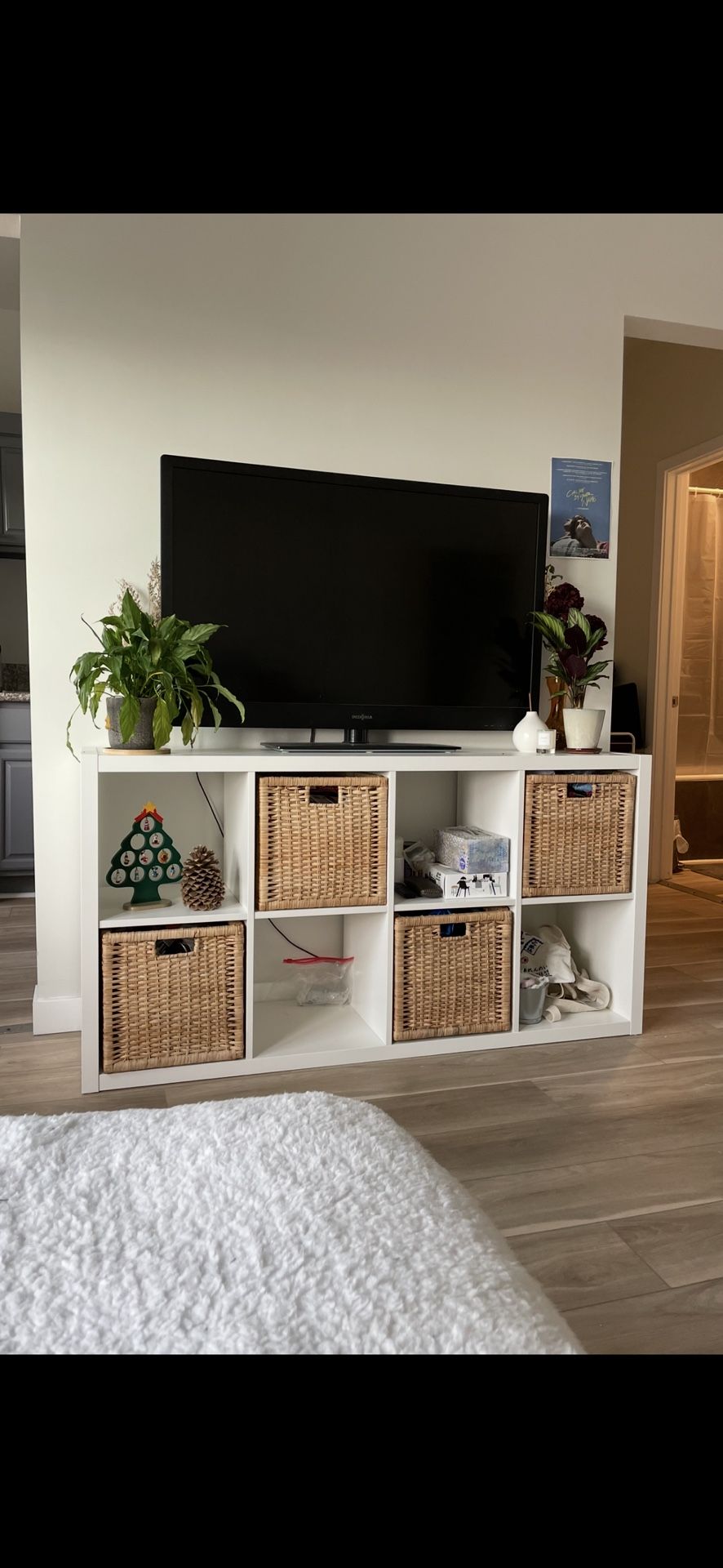 White Storage Shelf with Rattan Baskets