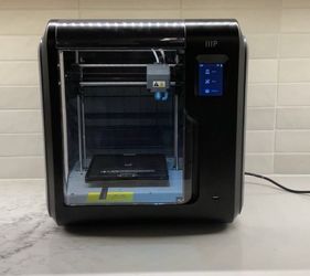 IIIP Mono price voxel 3-D printer, black enclosed